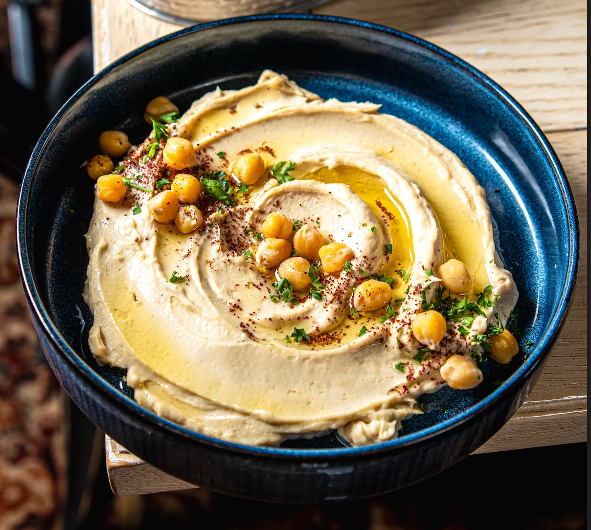 Creamy Mediterranean hummus drizzled with olive oil