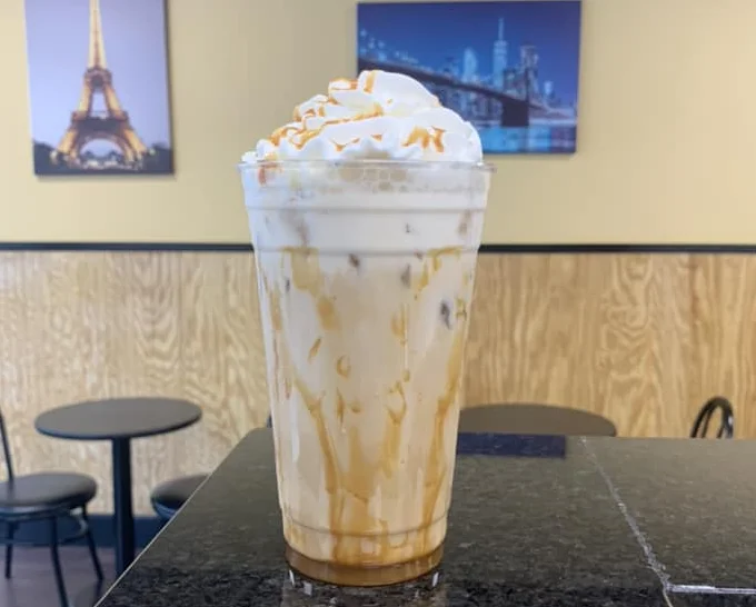 A tall fresh cup of coffee