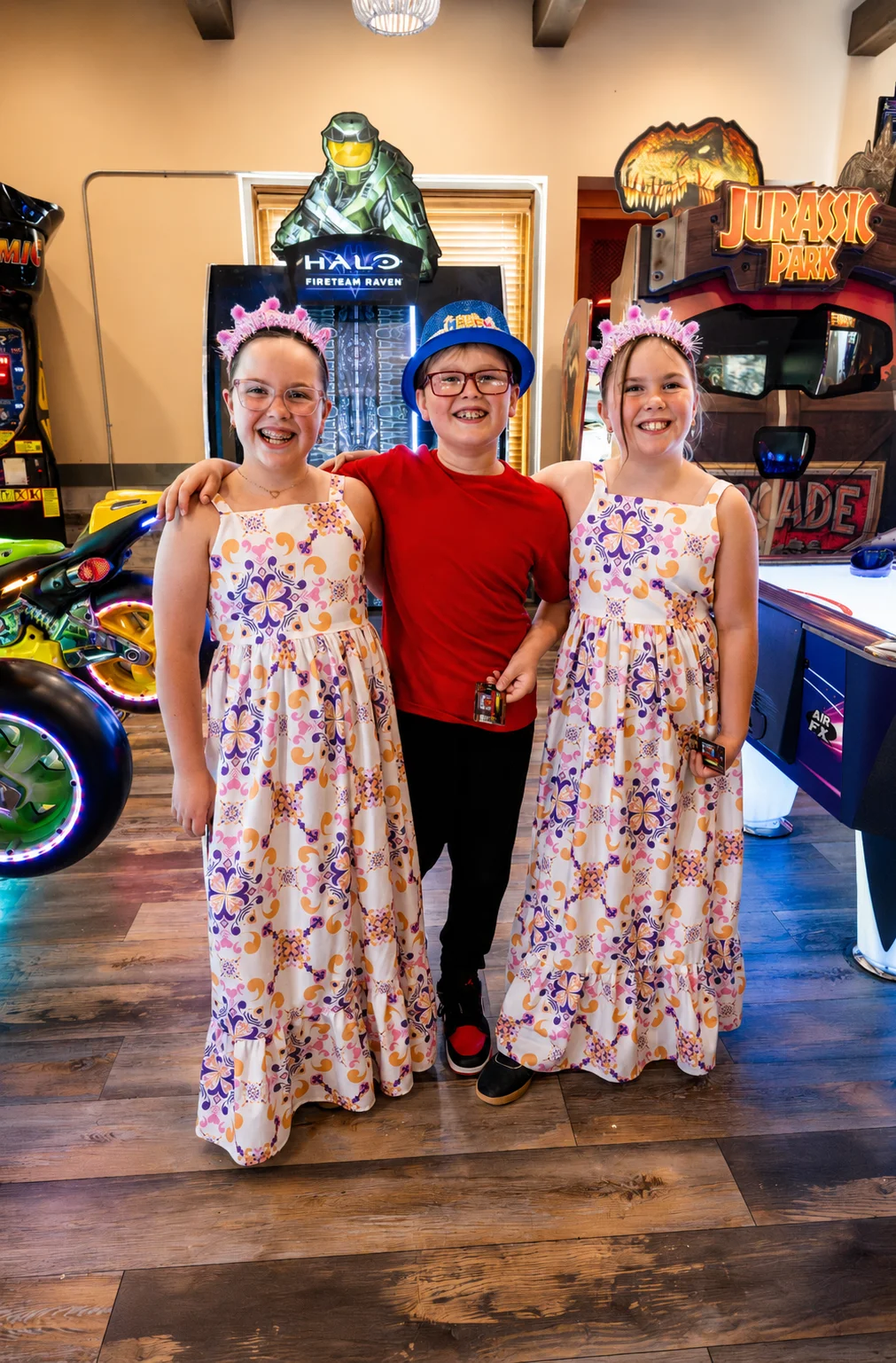 two girls and a boy at a birthday party