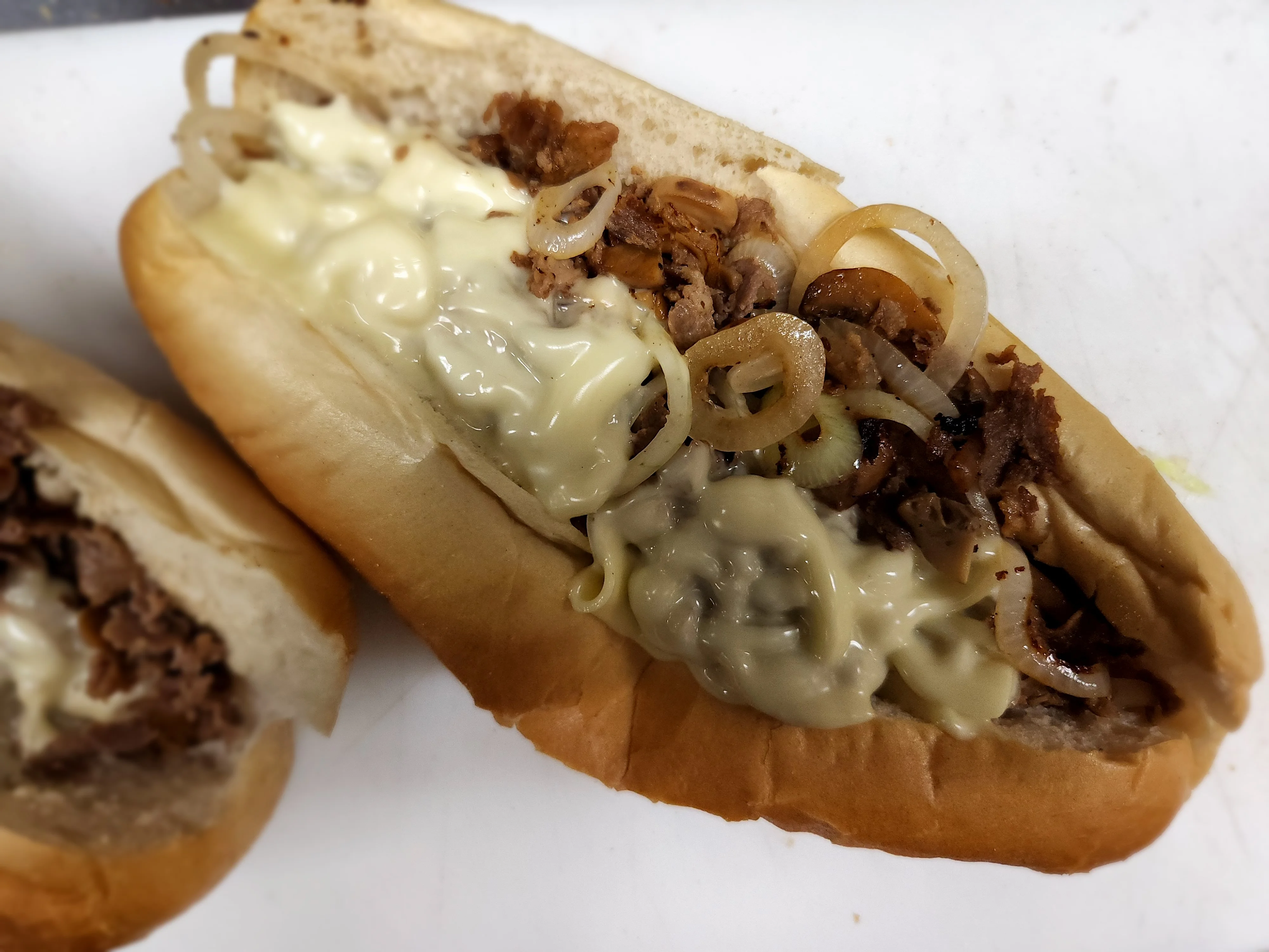 Philly cheesesteak sandwich with sautéed onions