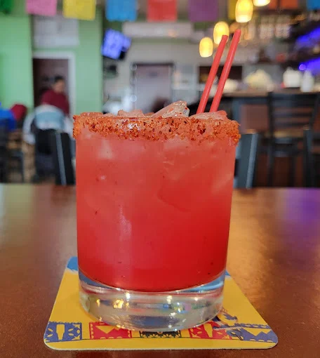 Refreshing Mexican cocktail with a spicy rim