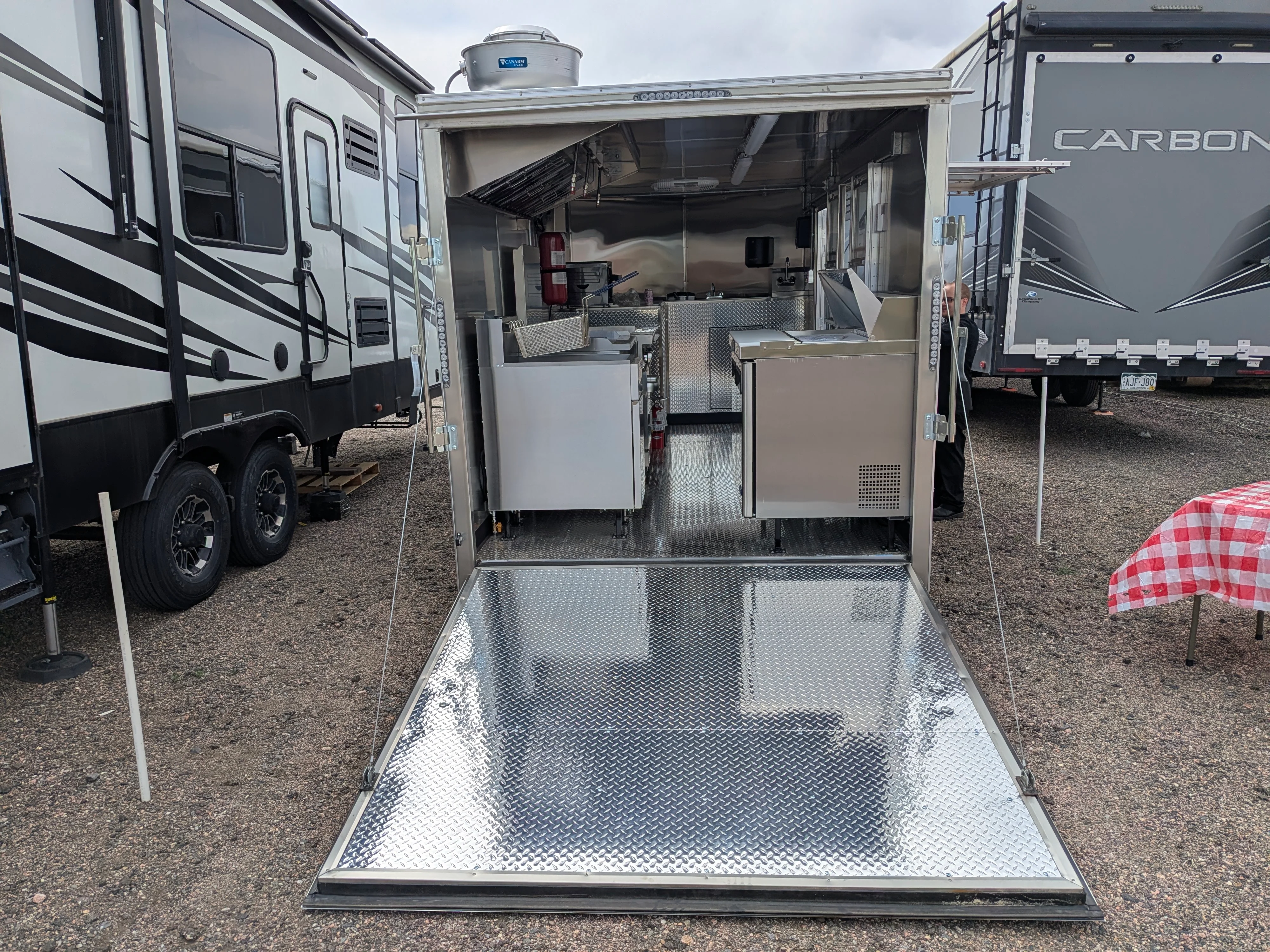 Mobile food trailer with stainless steel kitchen equipment