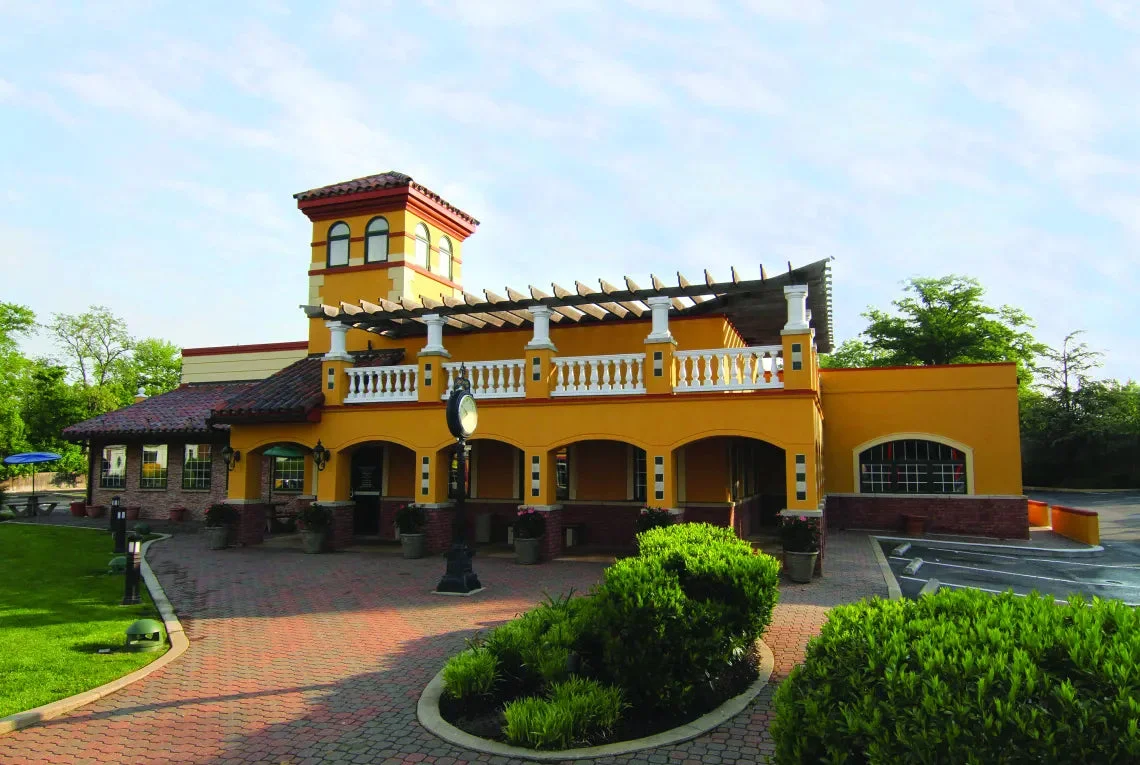 Colorful restaurant exterior with Mediterranean architecture