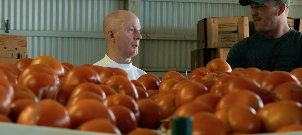 A restaurant chef preparing a dish
