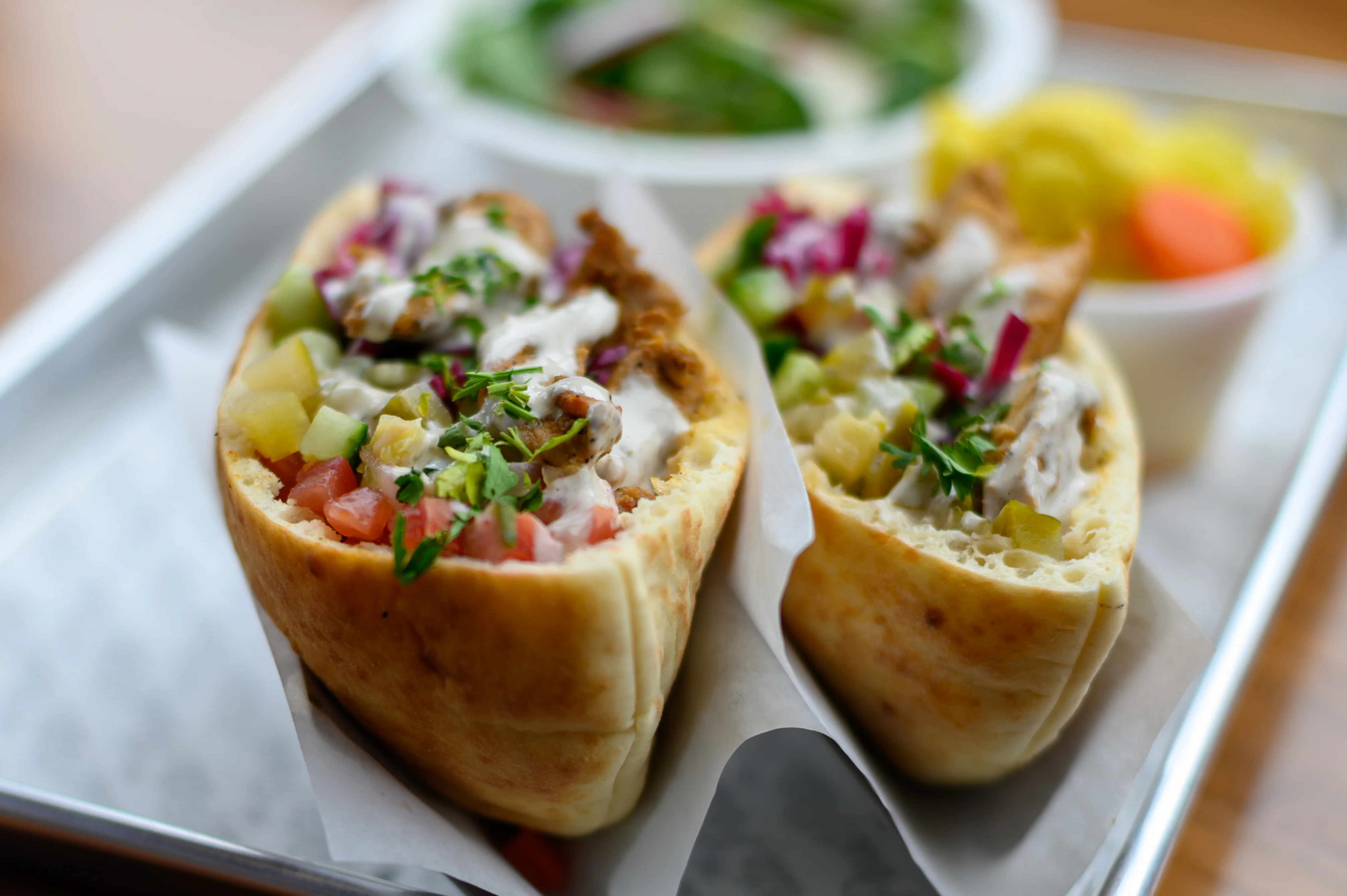 Soft pita bread stuffed with chicken and an assortment of veggies