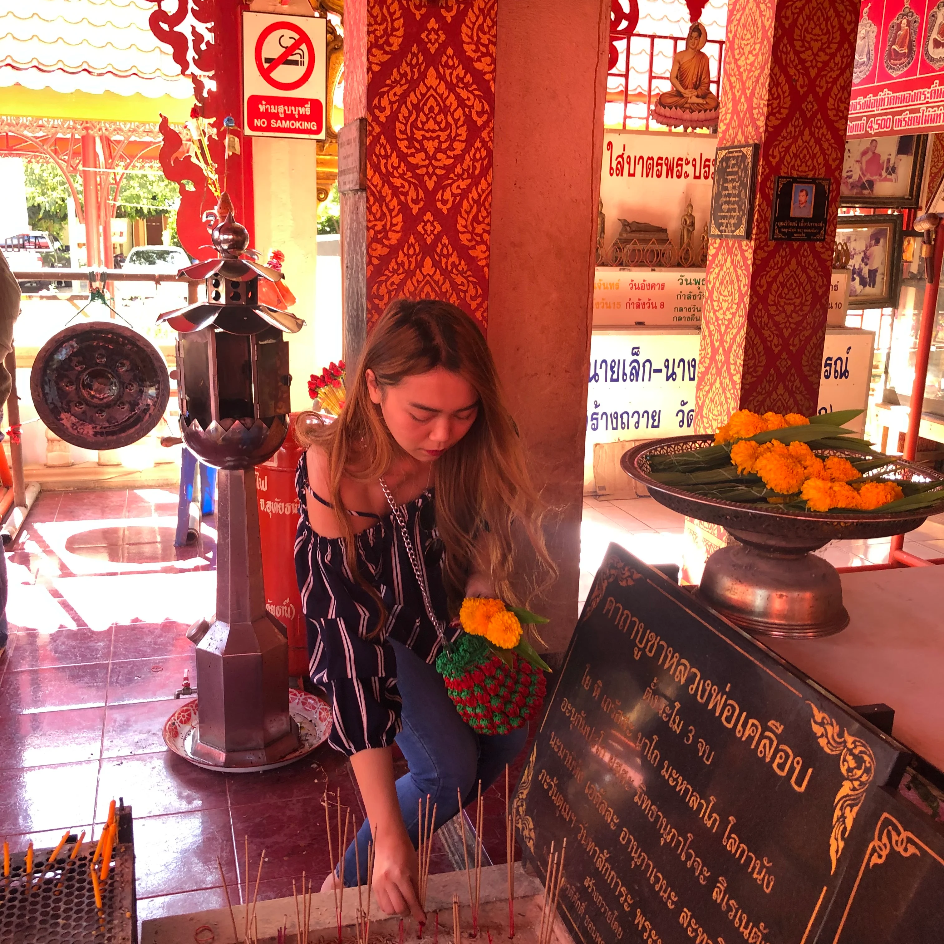 Woman praying at temple