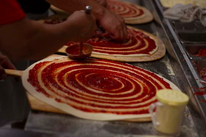 A restaurant chef preparing a dish