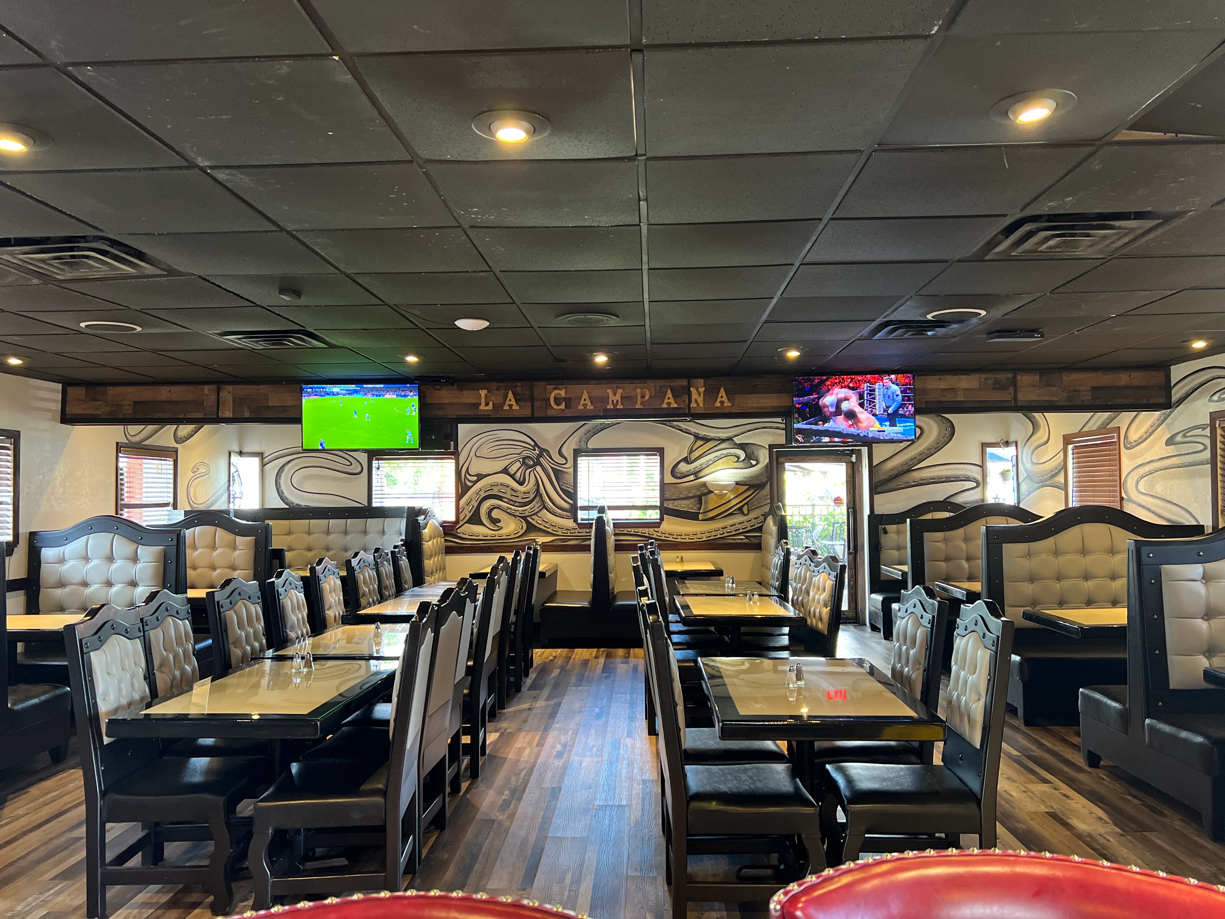 Cozy restaurant interior with modern decor and seating