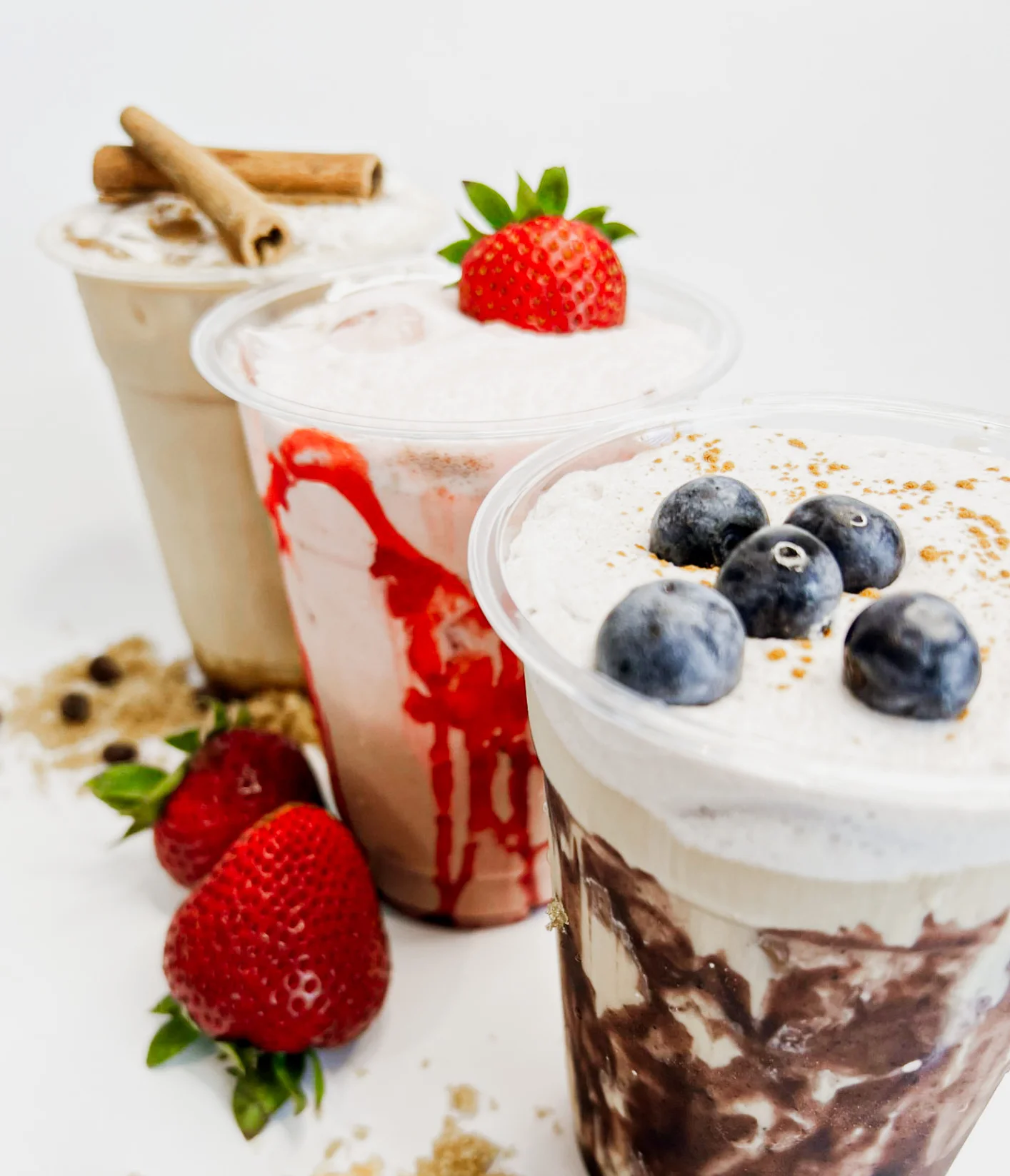 Refreshing milkshakes with strawberries and blueberries