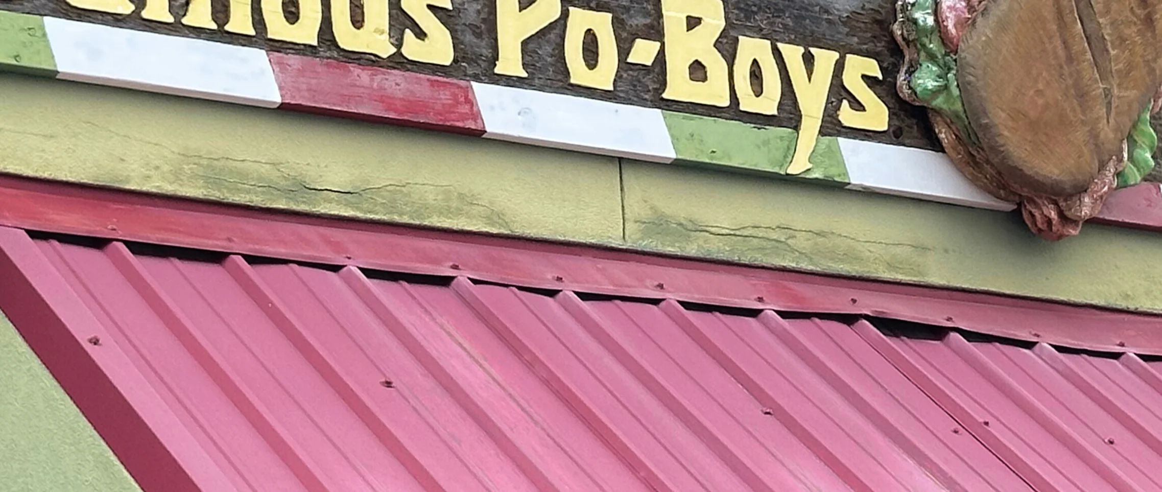 Sign for Radosa's Famous Po-Boys restaurant