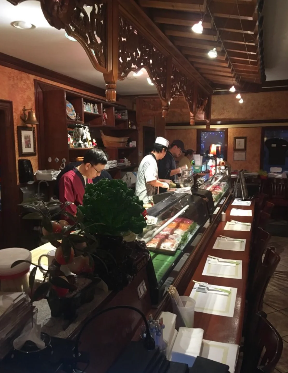 Delicious gourmet burger with fresh toppings on a wooden table