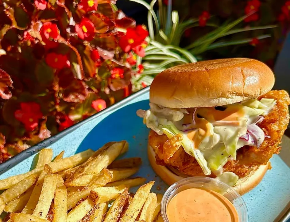 Crispy fried chicken sandwich with fries