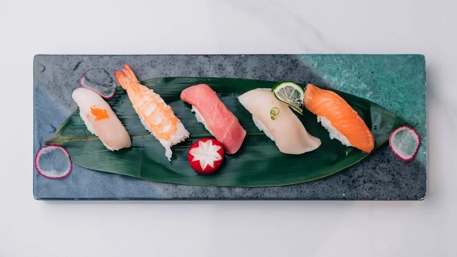 Assorted Japanese sushi platter on a leaf