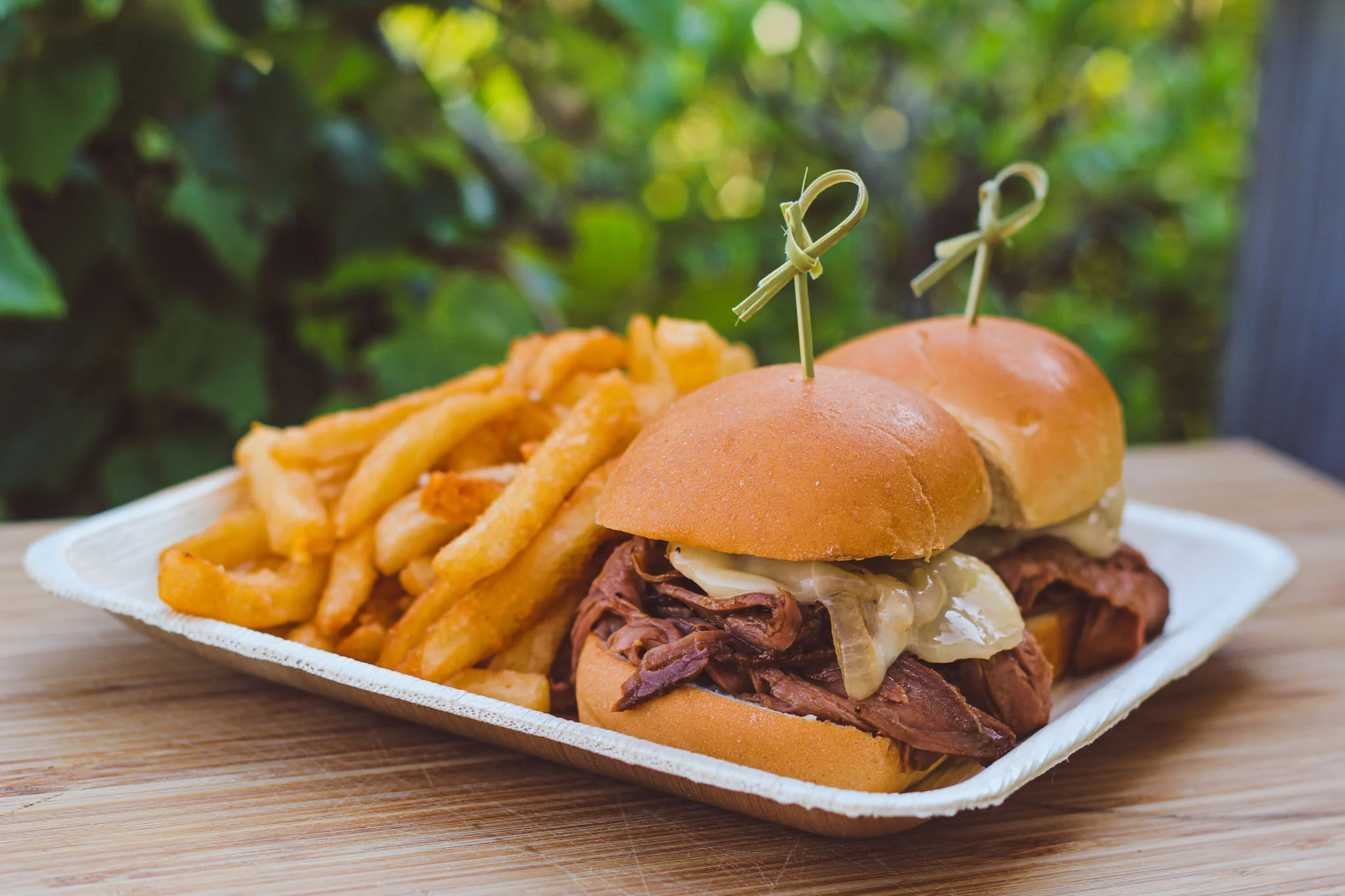 Savory beef sliders with caramelized onions and crispy fries
