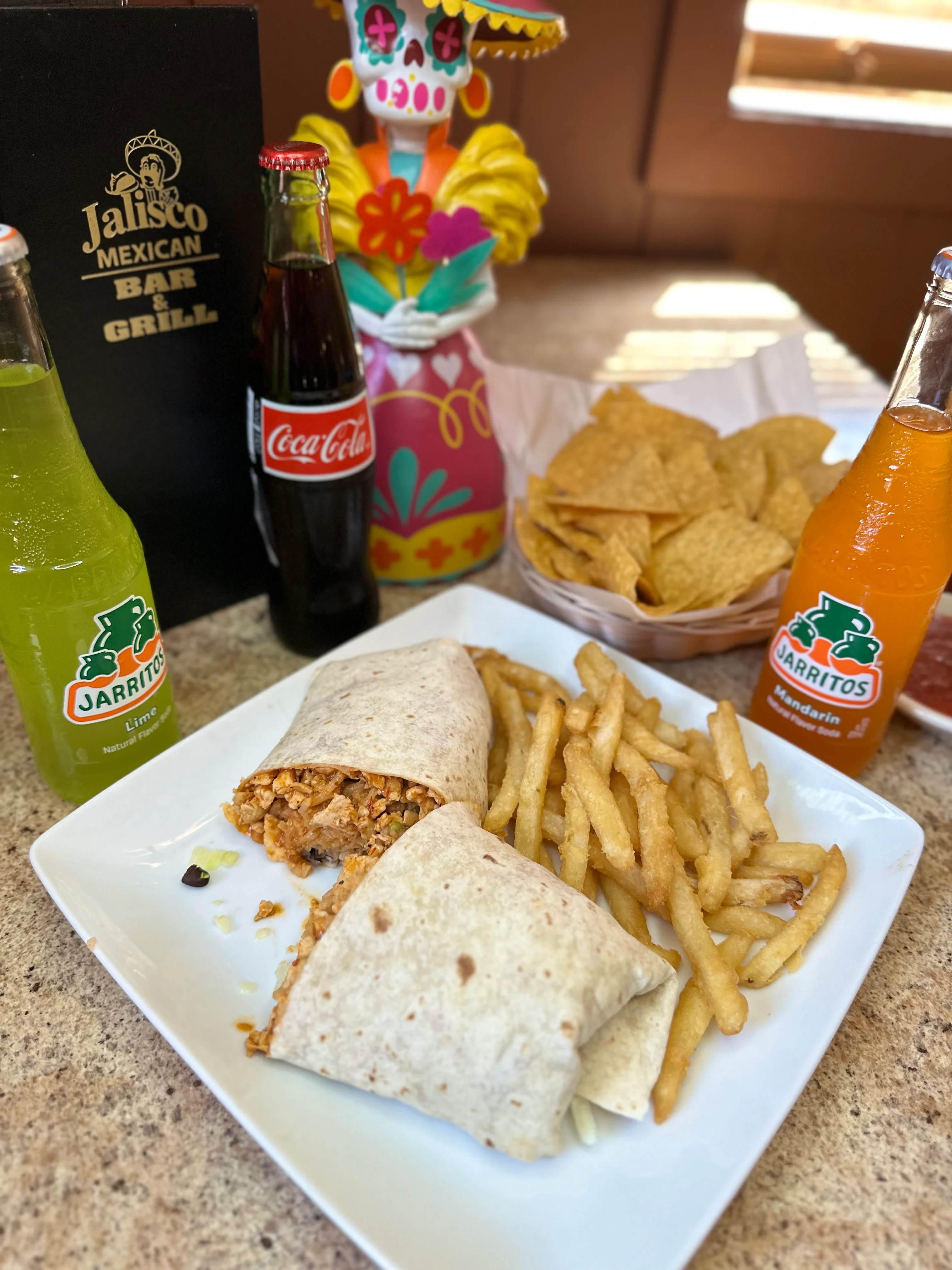 Delicious burrito with fries at a Mexican restaurant