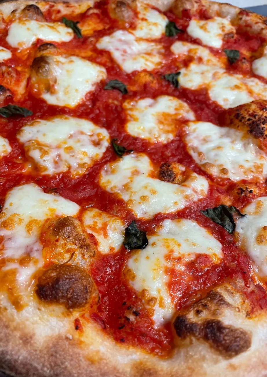 Margherita pizza with fresh mozzarella and basil