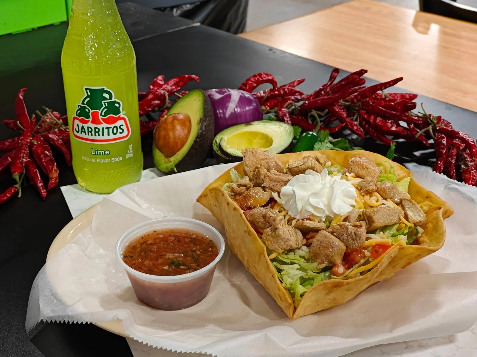 Mexican chicken taco salad in a crispy shell