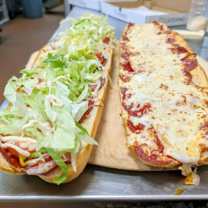 Italian sub sandwich with fresh toppings and pepperoni pizza