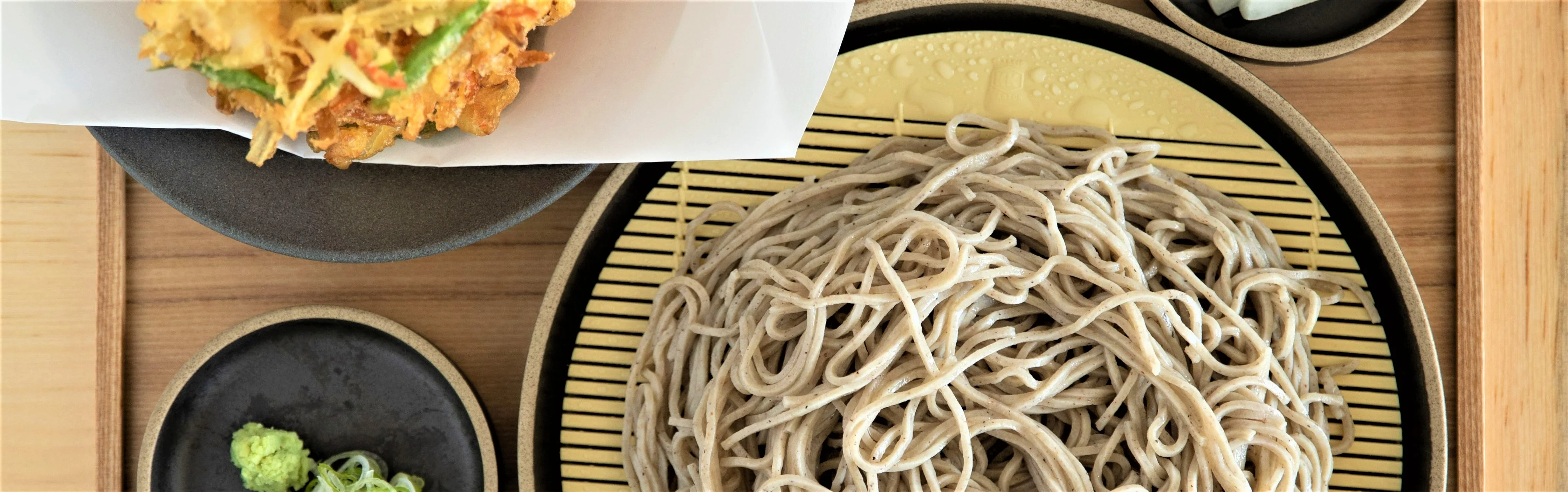 Japanese zaru soba served with tempura and wasabi