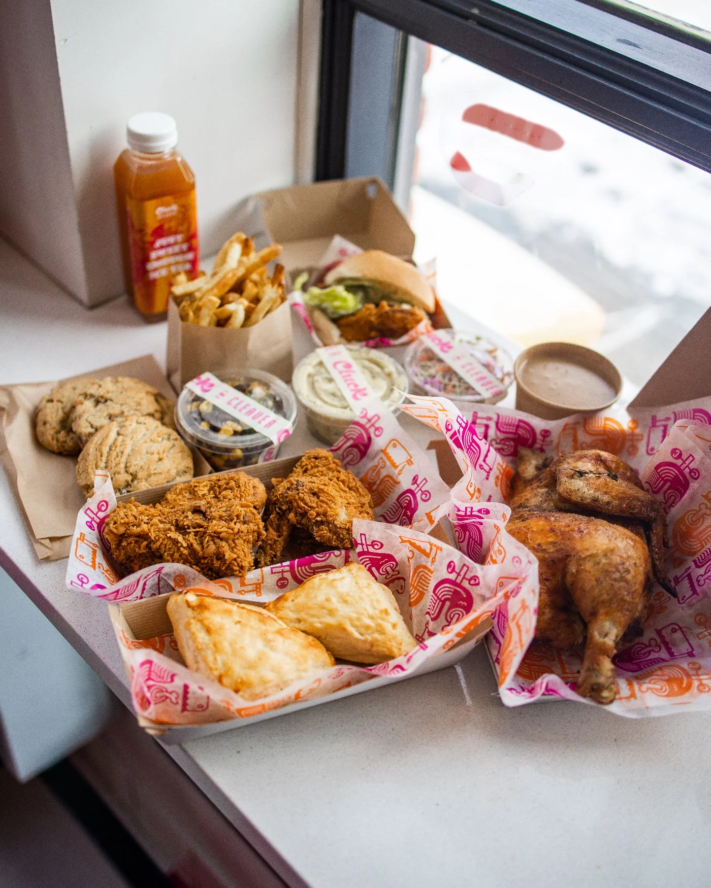 Crispy halal fried chicken and scratch-made biscuits from Cluck N Cleaver, Calgary's favourite chicken restaurant