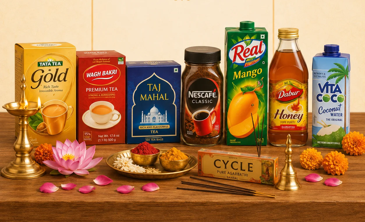 Assorted beverages and teas arranged on a wooden table with decorative elements.