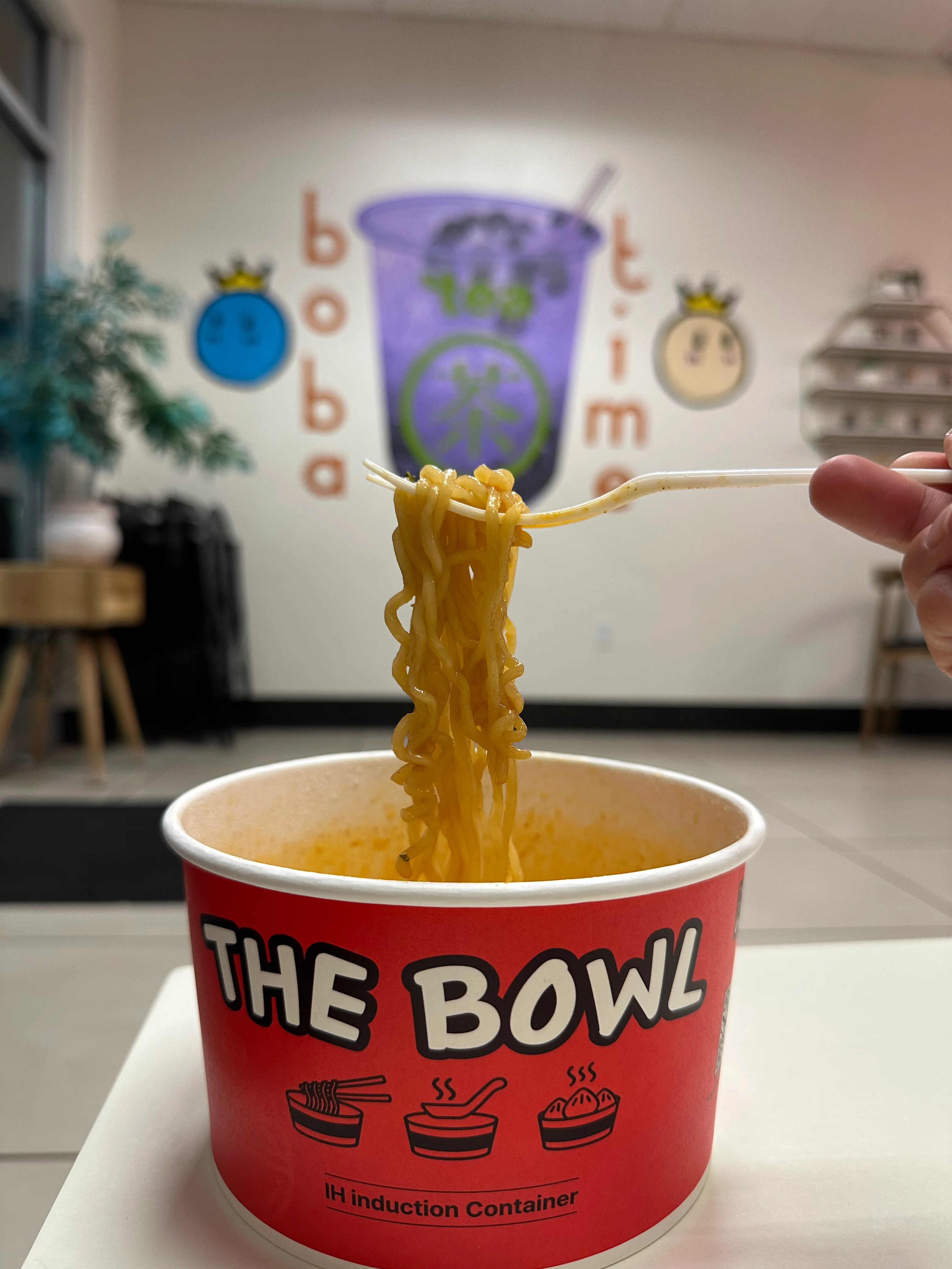 Bowl of spicy Korean ramen with chopsticks
