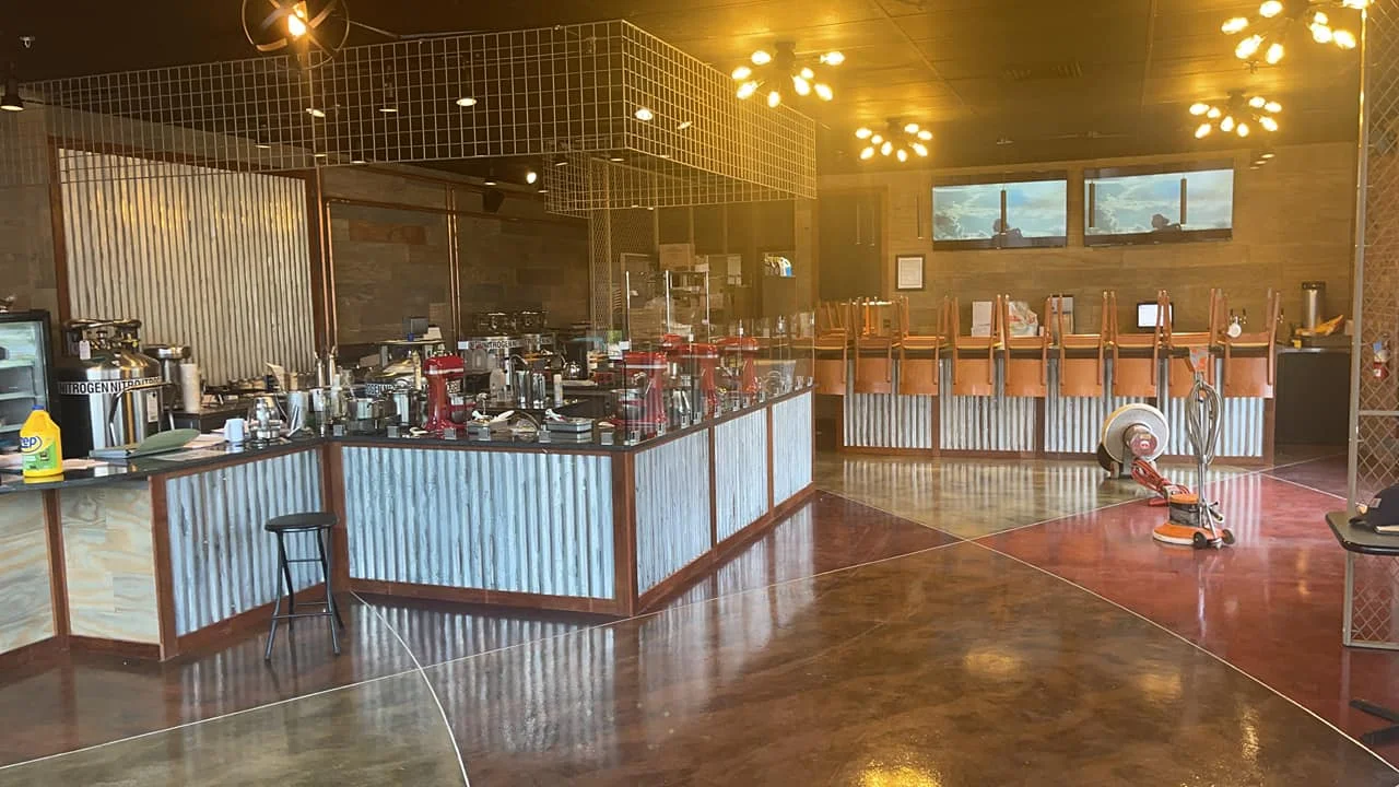 Modern coffee shop interior with stylish decor and equipment