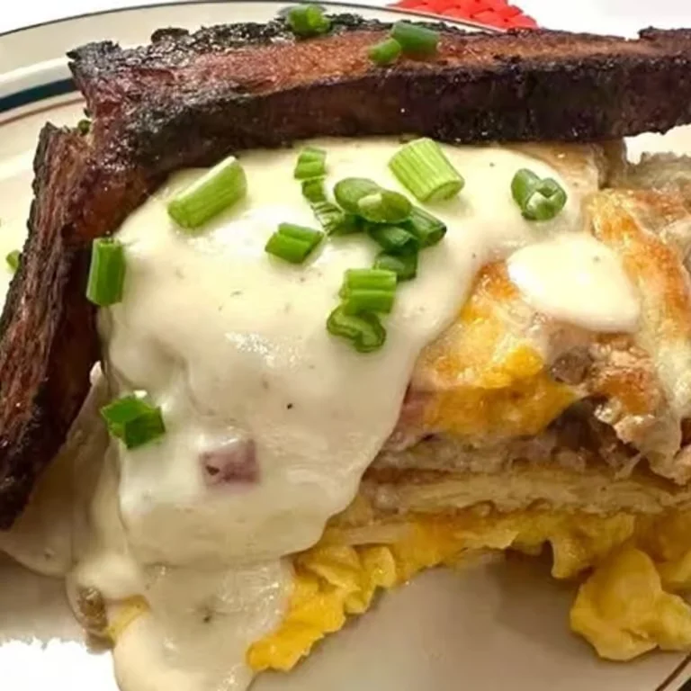 Classic American steak and eggs with creamy cheese sauce