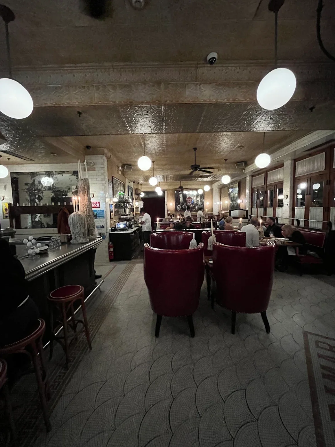 Cozy restaurant interior with vintage decor and warm lighting