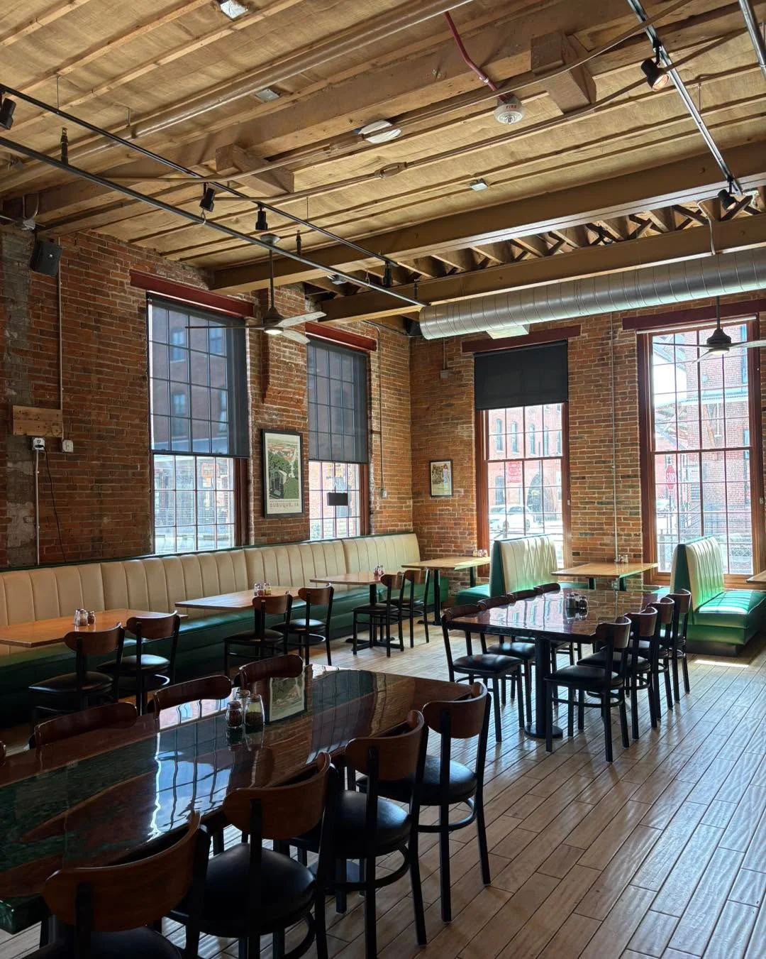 Cozy restaurant interior with exposed brick and wooden beams