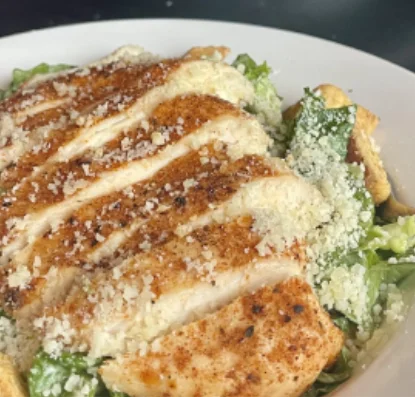 Grilled chicken Caesar salad with parmesan