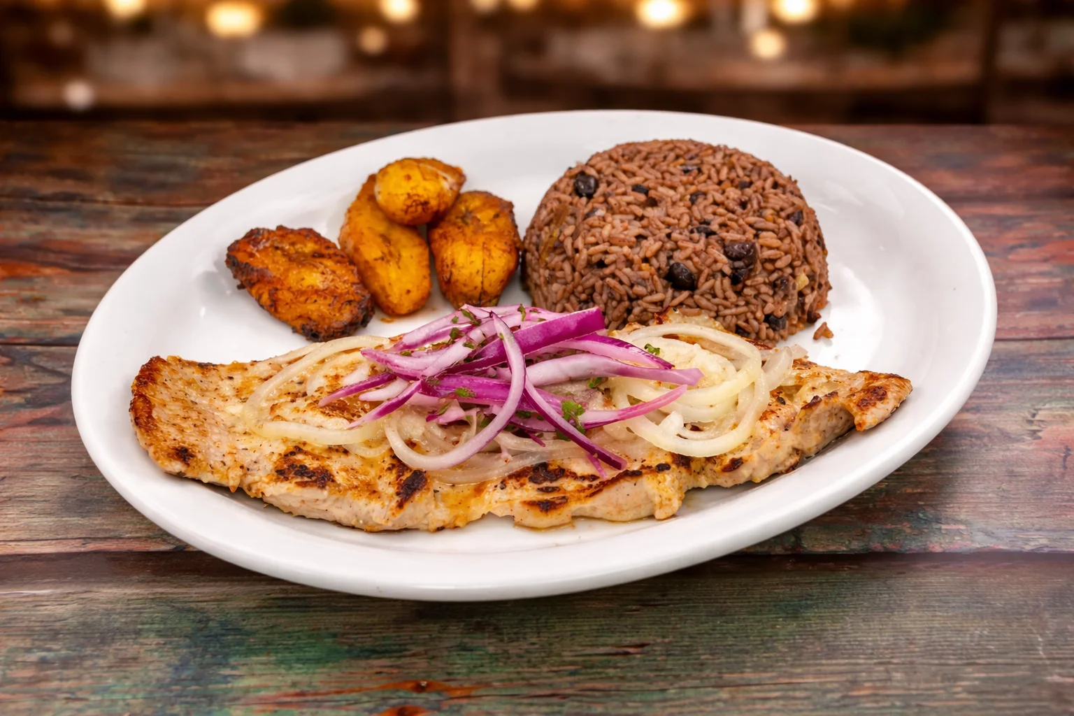 Grilled fish with rice and plantains, a traditional Caribbean dish
