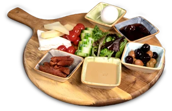 Mediterranean mezze platter with assorted dips and fresh vegetables