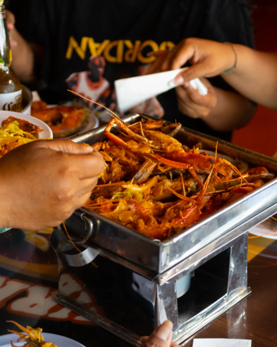 Delicious gourmet burger with fresh toppings on a wooden table