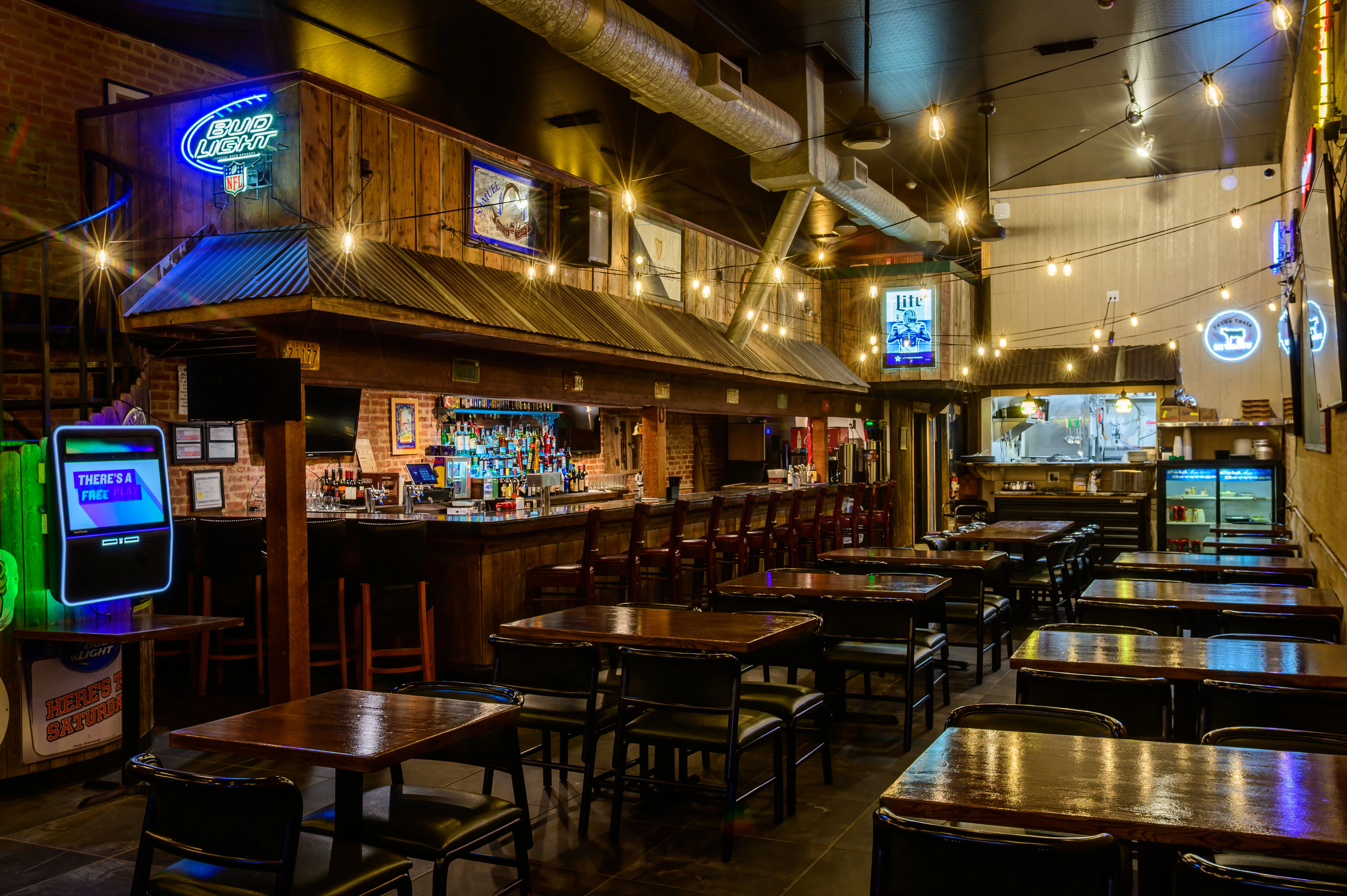 Cozy restaurant interior with bar and warm lighting