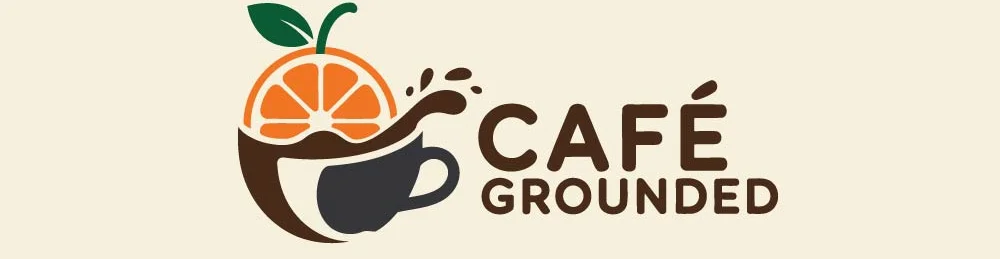 Logo of Café Grounded featuring a coffee cup and orange slice