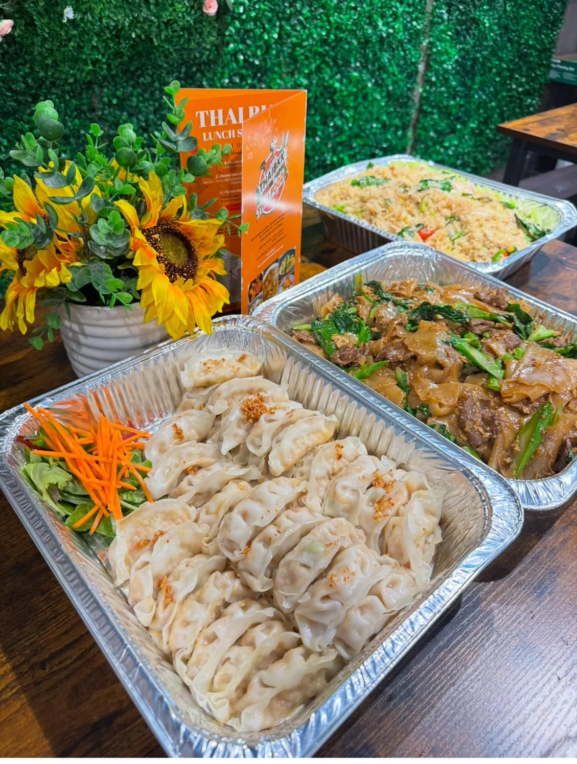 Delicious Thai dumplings with vibrant sides
