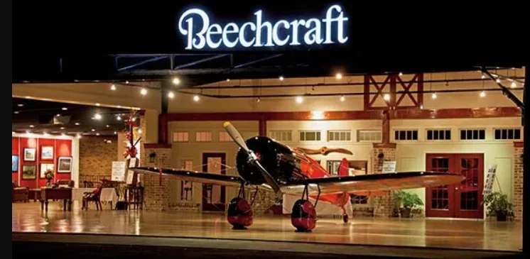 Beechcraft restaurant exterior with vintage airplane display