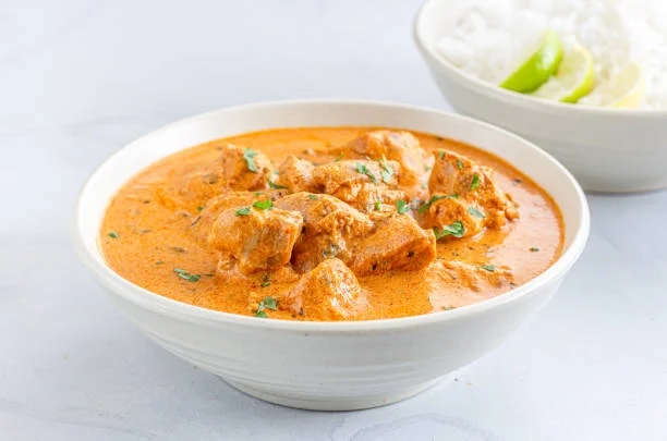 Creamy Indian butter chicken served with rice