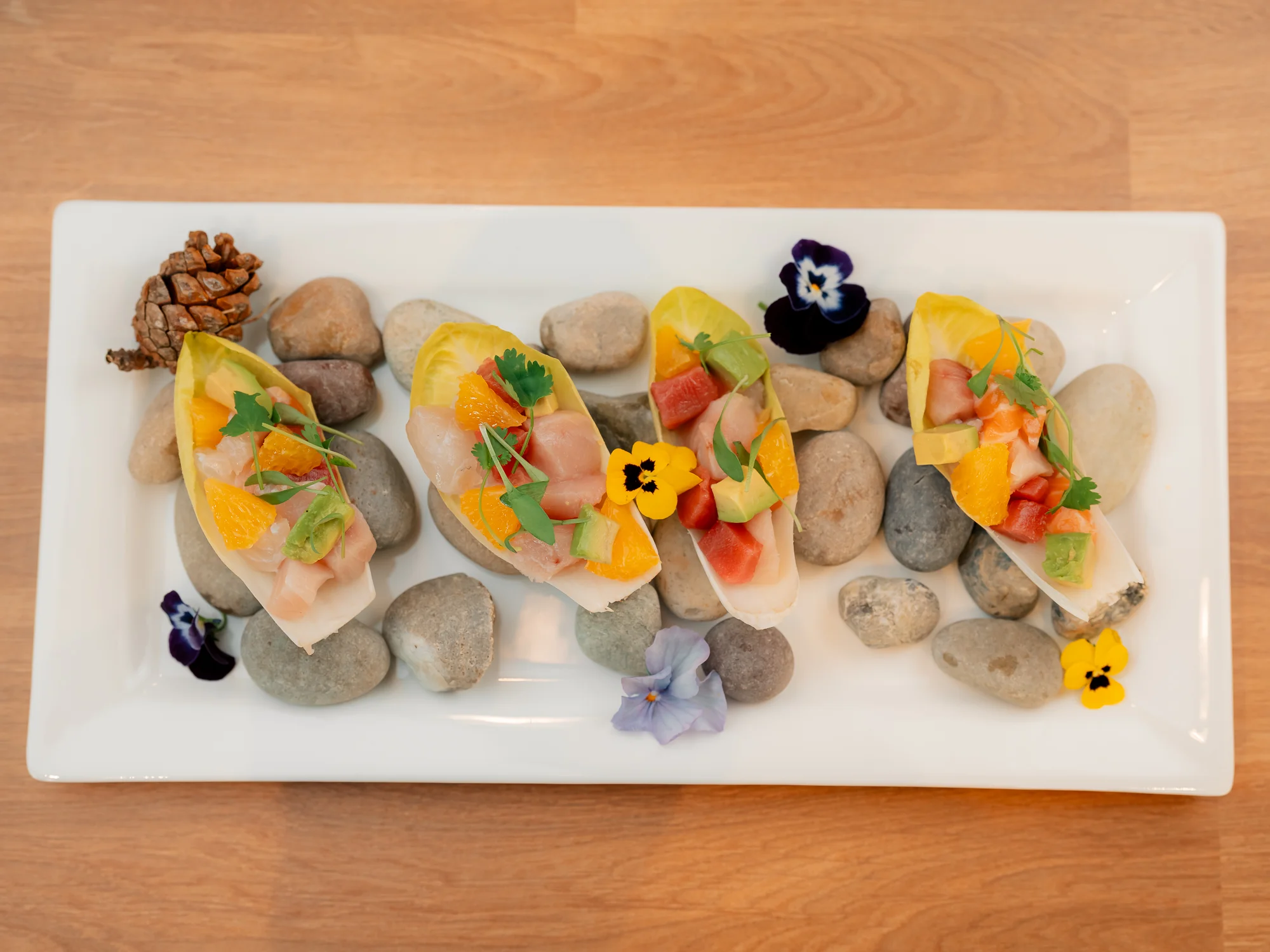 Ceviche-style seafood appetizers on a platter