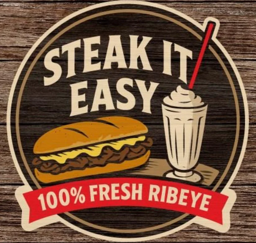 An assortment of fast food items, including burgers, fries, onion rings, chicken wings, and pickles, all beautifully arranged on a wooden surface.