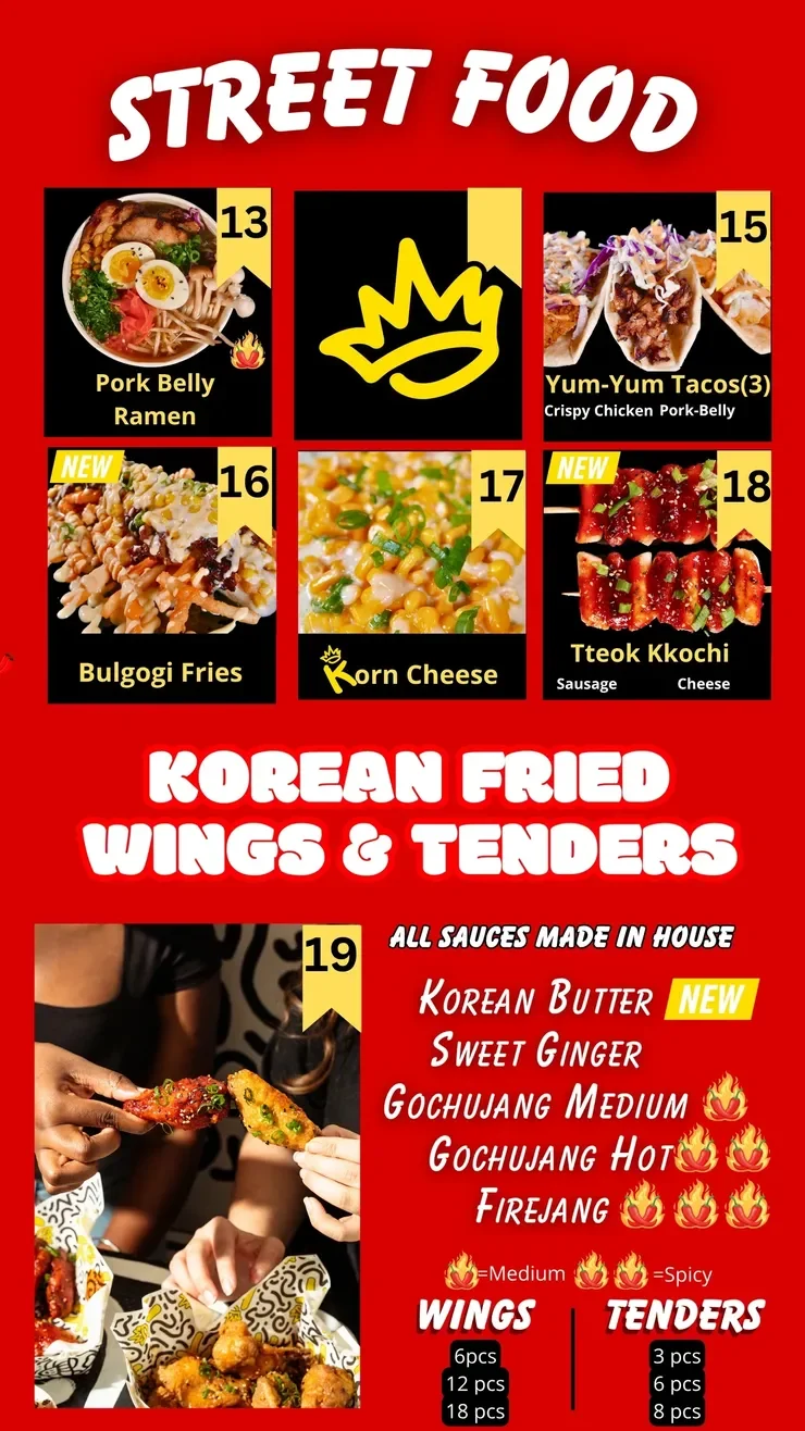 Korean street food platter featuring wings and tenders with various sauces