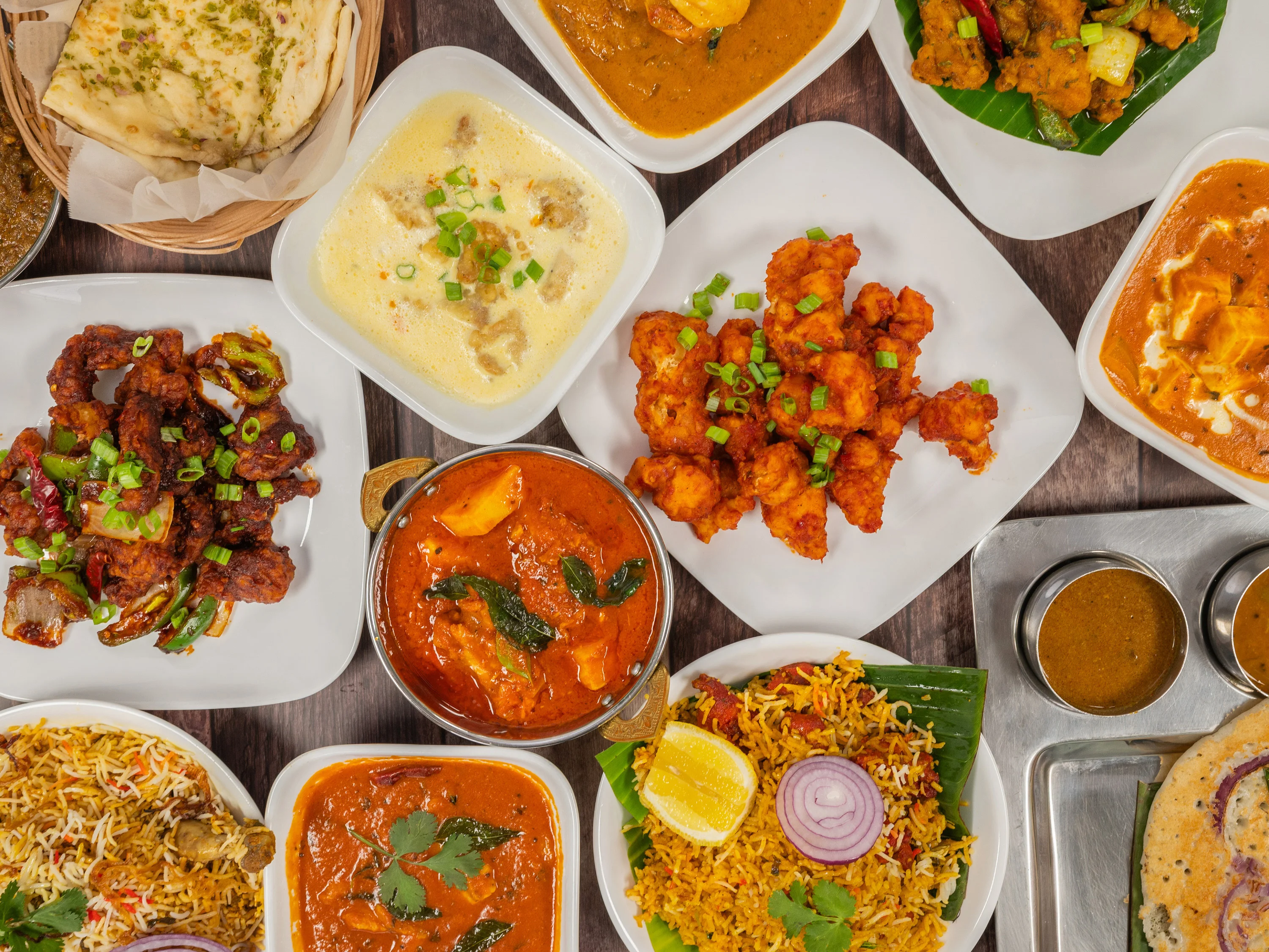 Assorted Indian dishes including biryani and curry