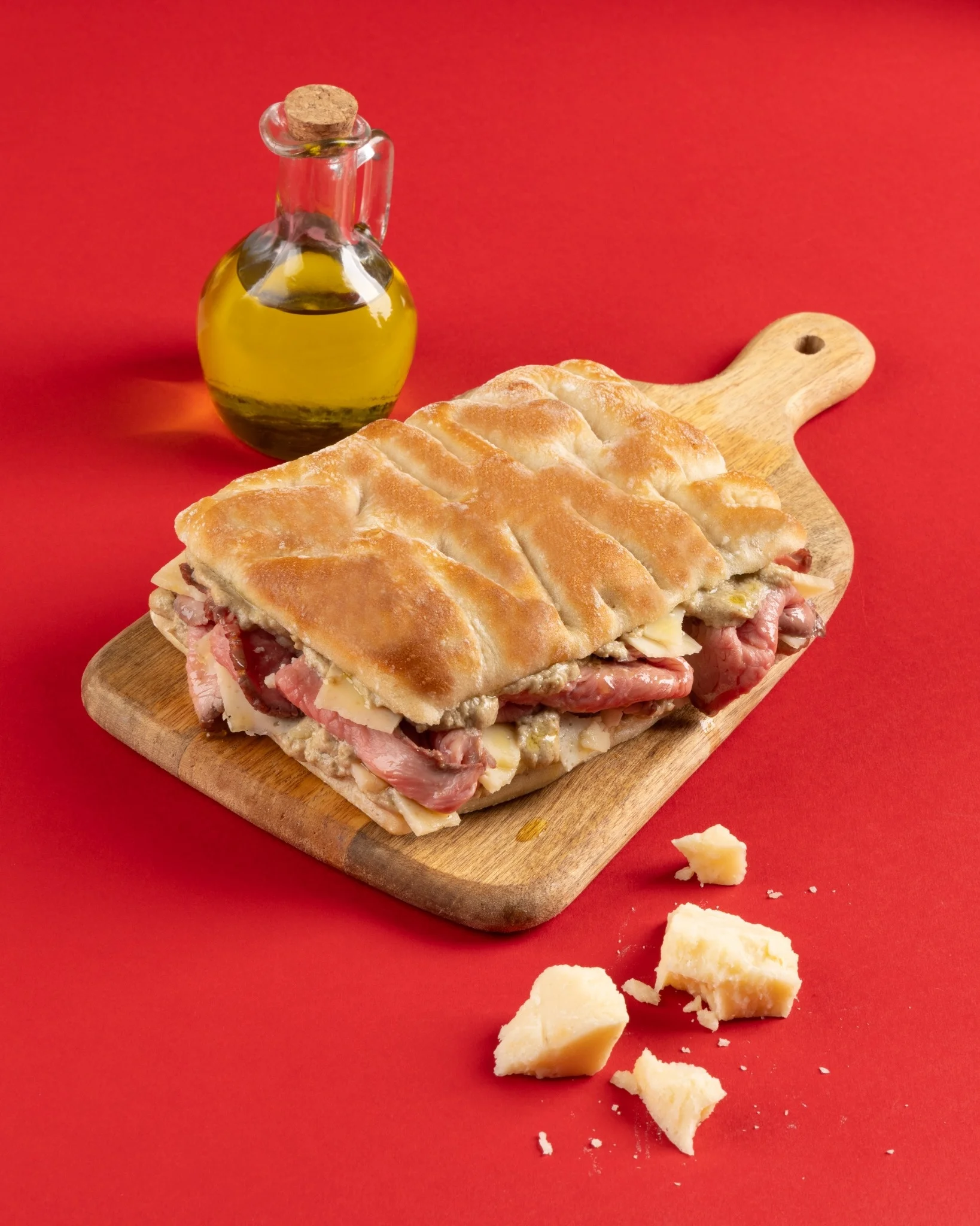 Italian panini sandwich with cured meats and cheese