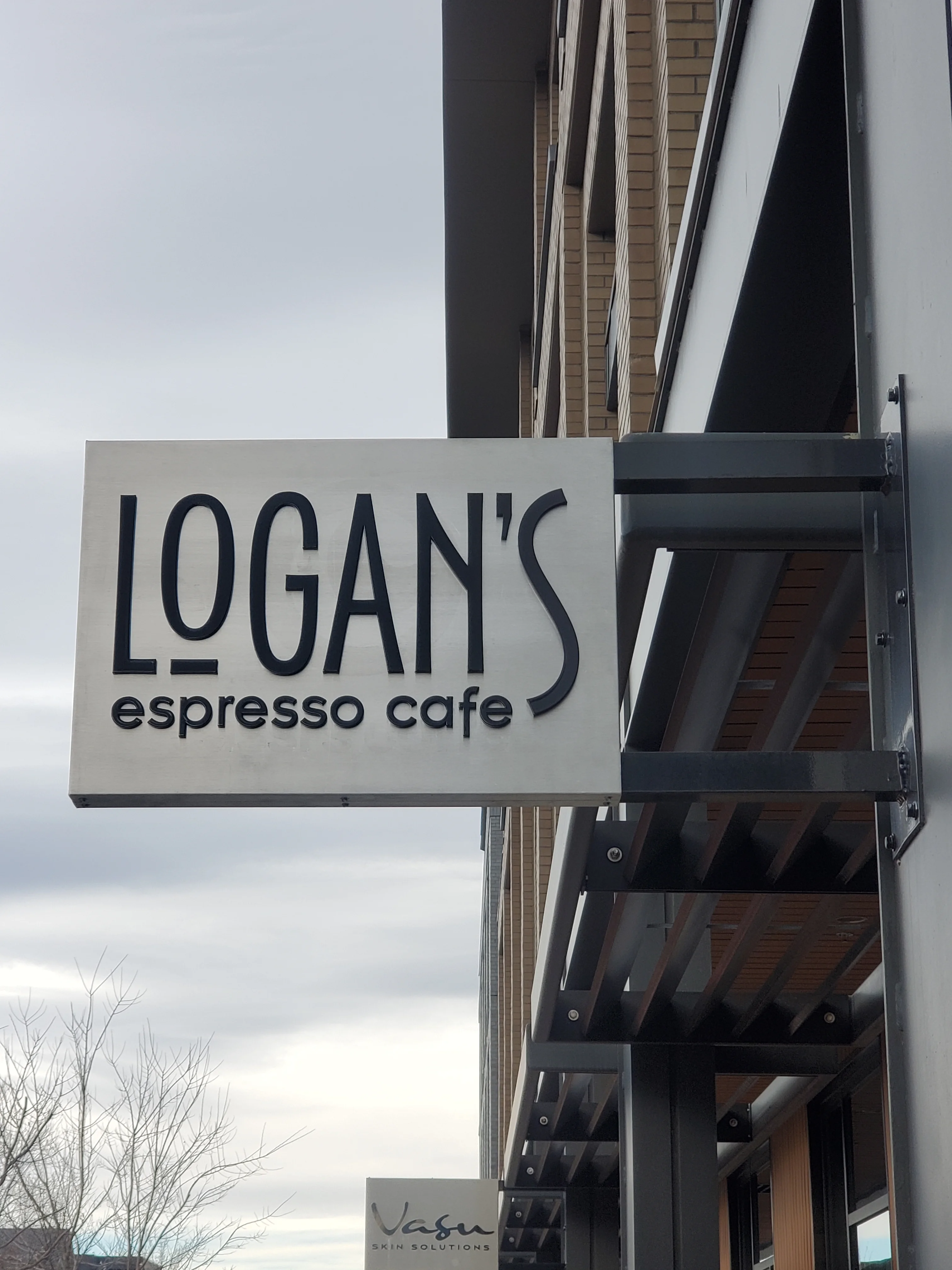 Sign for Logan's Espresso Cafe with modern design