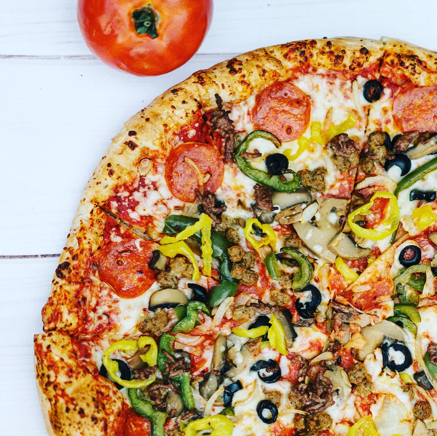 Loaded meat lover's pizza with fresh toppings