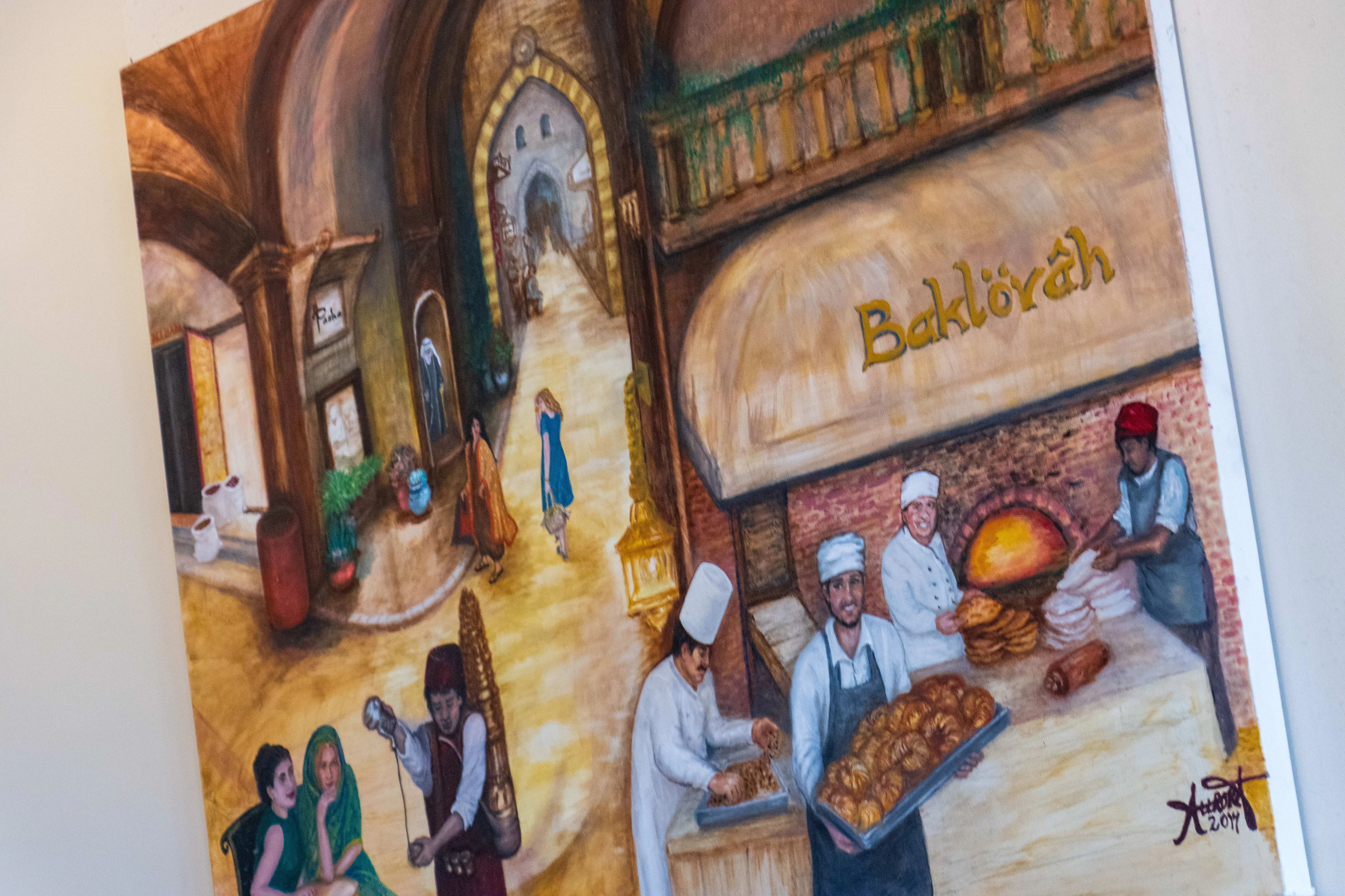 Colorful mural depicting a traditional bakery scene