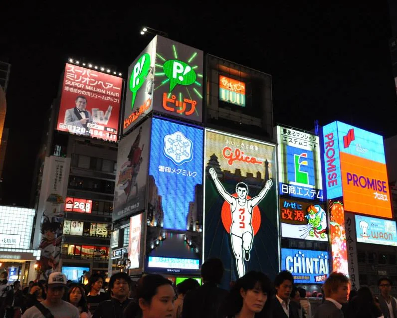 Vibrant cityscape of Dotonbori with neon signs at night