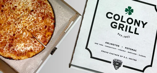 Cheese pizza from Colony Grill in a takeout box