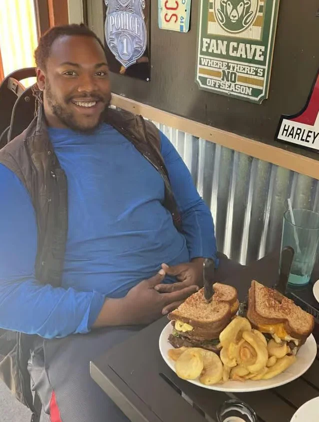 Hearty sandwiches with fries in a cozy restaurant setting